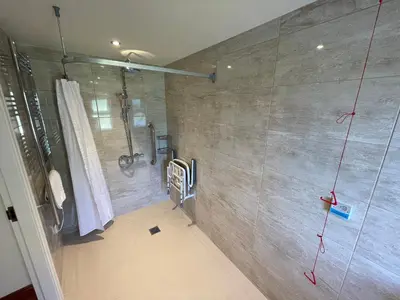 a bathroom with a shower and a shower at Victoria Mount in Grange Over Sands
