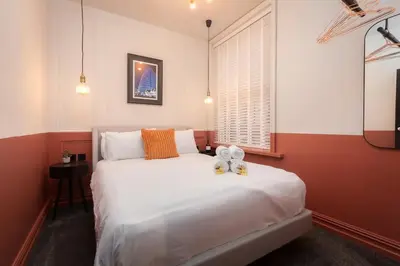 a bedroom with a bed with two teddy bears on it at Capri Stays - Apartment Two - Two Bed Apartment in Blackpool