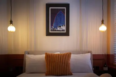 a living room with a couch and two lights at Capri Stays - Apartment Two - Two Bed Apartment in Blackpool