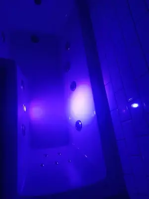 a blue light in a room with a tile floor at Withnell Stays - Apartment Six in Blackpool