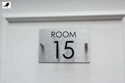a sign that says room on a door at Blackbird Accommodation and Luxury Apartments room 15 in Blackpool