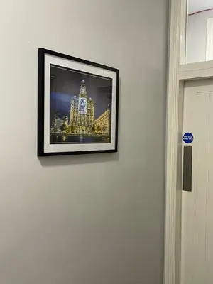 a picture of a city on a wall at 264 The Road End in Liverpool