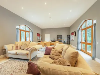 a living room with a couch and a table at Hoole Summer House in Elswick