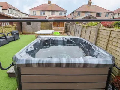 a jacuzzi tub in the backyard of a house at 71 Nutter Road in Cleveleys