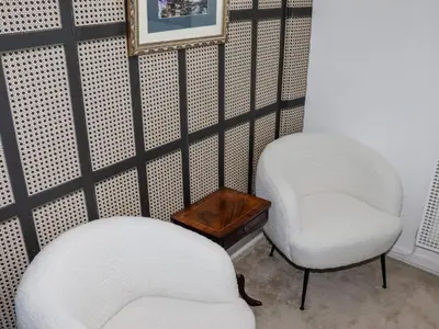 two white chairs and a table in a room at 112 Balmoral Road in Morecambe
