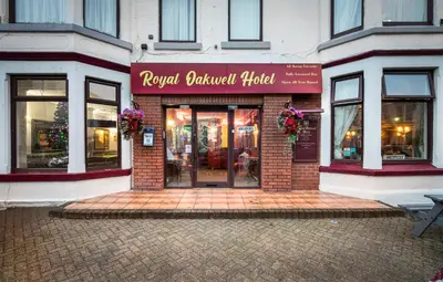 a store front of a brick building with a sign at Royal Oakwell Hotel in Blackpool