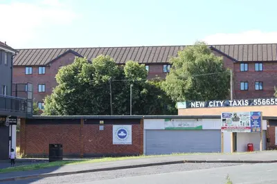 a brick building with a new city taxes sign on it at Two Bedroom Apartment, Free parking, Close to UCLAN and free WIFI in Preston