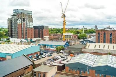 an aerial view of a city with a crane at Bright, Luxury Aparthotel, Excellent Location in Liverpool