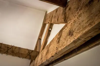 a close up of a wooden beam on a ceiling at Warehouse Apartment-1 King Bed Sleeps 2 in Ulverston