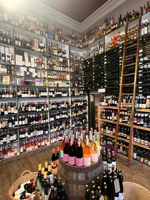 a room filled with lots of bottles of wine at Cheerful and spacious 3 bed home in Clitheroe in Clitheroe