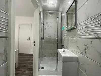 a bathroom with a shower and a sink at CityBreaks Rooms with Free Parking in Liverpool