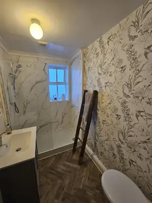 a bathroom with a shower and a sink and a toilet at Shakespeare’s Nest in Prescot