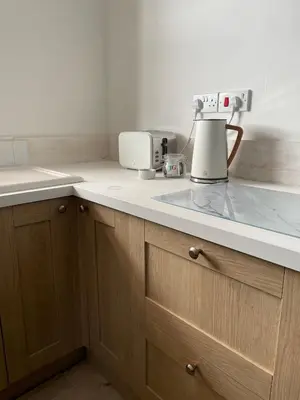 a kitchen with a counter top with a appliance on it at Shakespeare’s Nest in Prescot