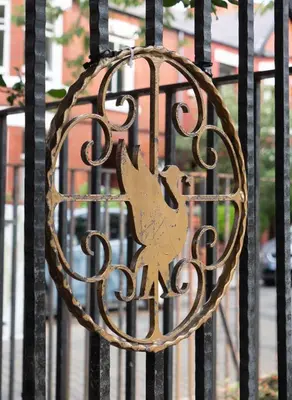 a metal door with a deer on a iron fence at Lancefield House - Air Host & Stay - 5 Bedroom Sleeps 15 in Walton on the Hill