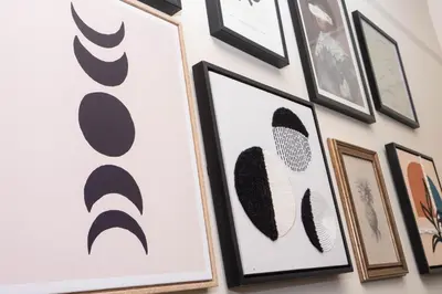 a collection of framed art on a wall at Lancefield House - Air Host & Stay - 5 Bedroom Sleeps 15 in Walton on the Hill