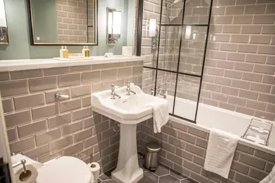 a bathroom with a sink and a shower and a toilet at Haighton Manor - Brunning and Price in Grimsargh
