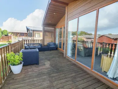 a deck with a view of a house at Gressingham 22 in Carnforth