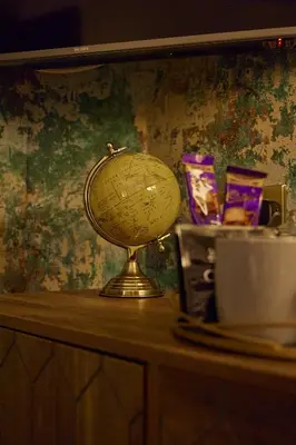 a gold globe sitting on top of a table at The Ribchester Arms in Blackburn