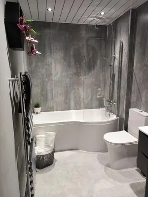 a bathroom with a tub and a toilet and a sink at The Ribchester Arms in Blackburn