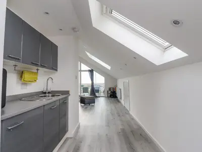 a kitchen with a sink and a counter top at Sea La Vie in Lytham St Annes