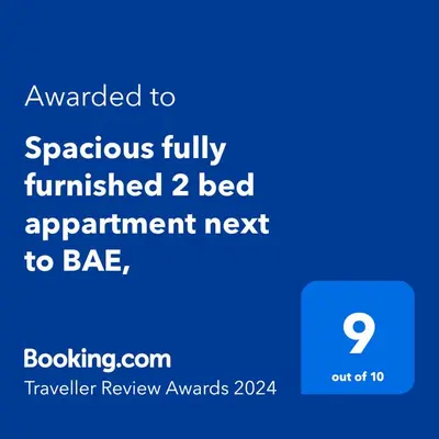a screenshot of a phone with the textanguardfully furnished bed apartment next to at Spacious 2 bed appartment next to BAE with spa bath in Barrow in Furness