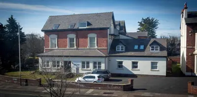 a house with a car parked in front of it at The Shelbourne in Southport