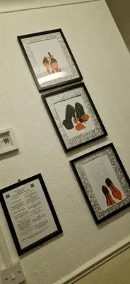 a group of pictures hanging on a wall at The Dudley Hotel in Blackpool