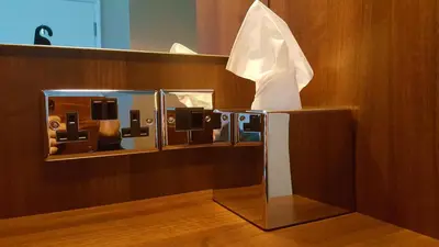a mirror on a wall in a room at Gabrielles in Blackpool