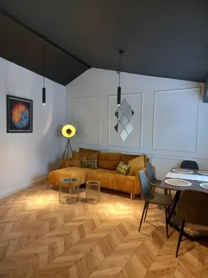 a living room with a couch and a table at L2 Apartments- City Center- 2 bed in Liverpool