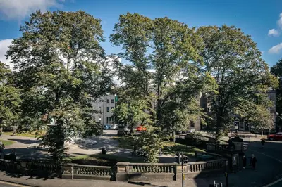 a large group of trees in a park at Dalton Sq Apartment 2 in Lancaster