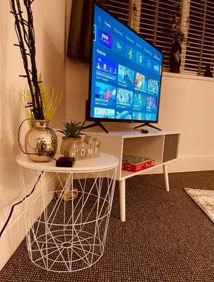 a computer monitor sitting on top of a desk at Luxury Suite 3 bed apartment sleeps 6-8 in Blackpool