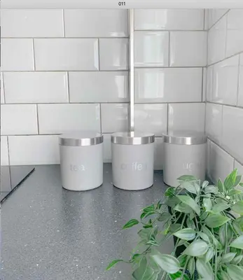 a group of three trash cans next to a plant at Duplex 2-bedroom apartment in Liverpool centre in Liverpool