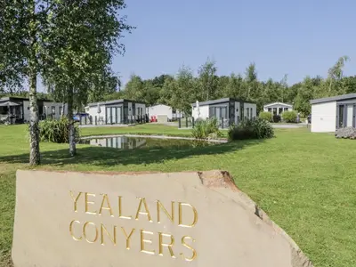 a sign that reads zealand computers in a park at Lilac Lodge in Carnforth