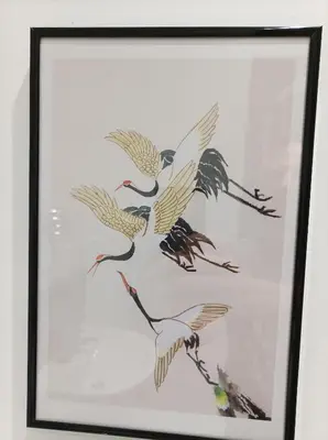 a framed picture of four birds in flight at Victorian Renovation Room 1 in Liverpool