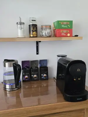 a kitchen counter with a coffee maker and a toaster at Victorian Renovation Room 7 in Liverpool