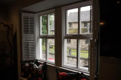 a window in a room with a view of a building at Number 10 in Whalley