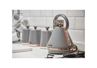 a tea kettle on a stove in a kitchen at Home at 2 Tancred Road Anfield in Liverpool