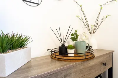 a wooden table with plants on top of it at Keith House - Air Host & Stay - Free Parking in Liverpool