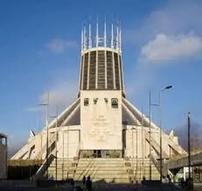 a large building with a tower on top of it at City Centre Vintage Theme Guest Rooms in Liverpool