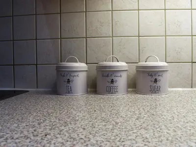 three buckets sitting on a counter in a kitchen at Shire Nooks in Hurst Green