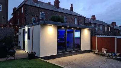 a contemporary extension to a house in a yard at Lovely unit elgin drive Coastal Bliss Your Seaside Retreat with City Excitement in Wallasey