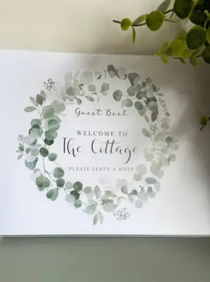 a heart shaped sign with a welcome to the office at The Cottage, a perfect getaway! in Southport