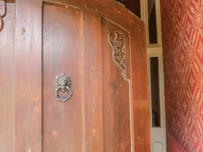a wooden door with a knob on it at Millwood Manor in Barrow in Furness