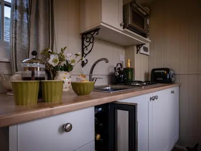 a kitchen counter with two green bowls on it at The Pleasant Hut at Mount Pleasant Farm in Ulverston