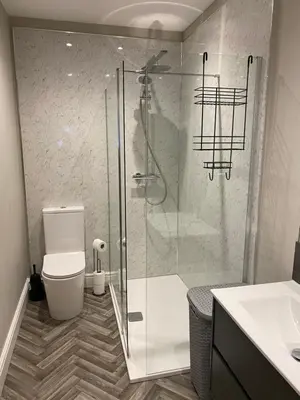 a bathroom with a shower and a toilet and a sink at The Fort Lytham St Annes in Lytham St Annes
