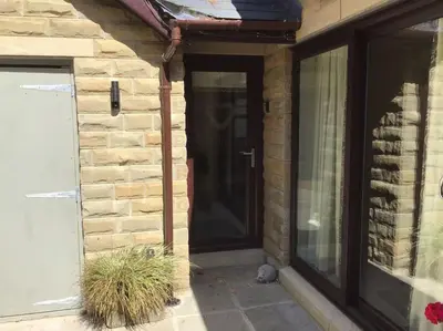 a front door of a house with a glass door at Beautiful 1 bedroom holiday home in Lancaster in Lancaster