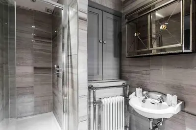 a bathroom with a sink and a shower at City Centre Georgian Townhouse in Liverpool