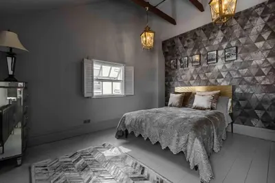 a bedroom with a bed and a window at City Centre Georgian Townhouse in Liverpool