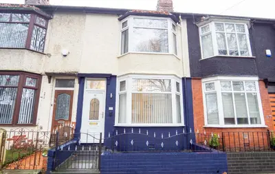 a house with blue steps in front of it at Stanley Park House - Air Host & Stay - Anfield in Liverpool