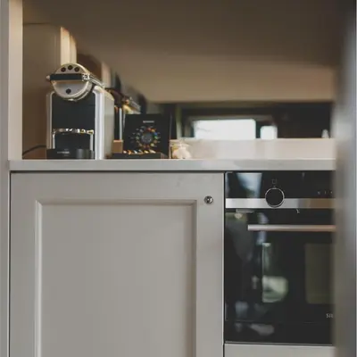 a kitchen with a stove and a counter top at Everything Retreat in Mellor